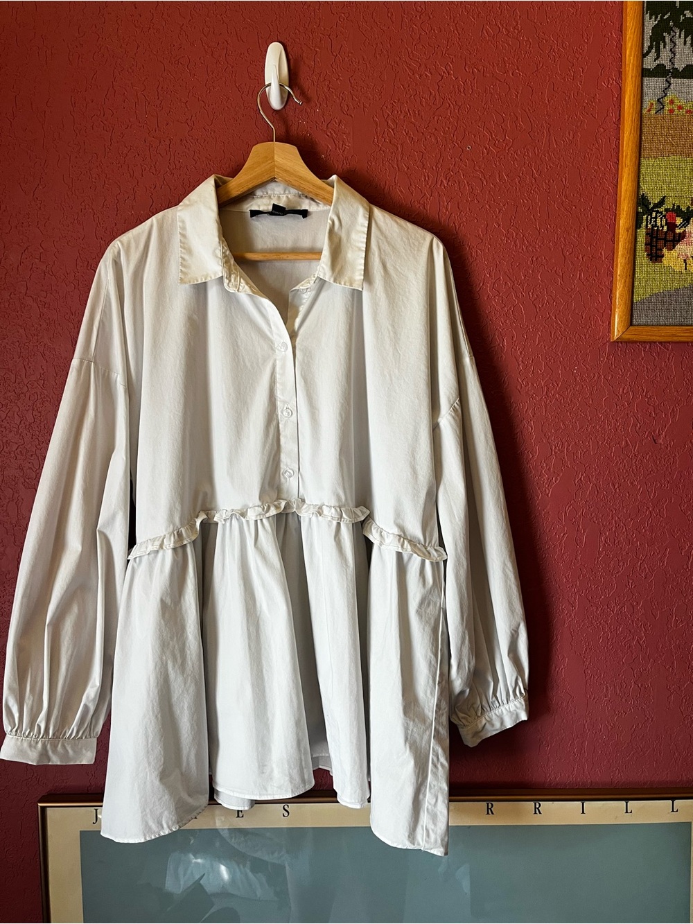 Button-up Blouse with Ruffle Bottom